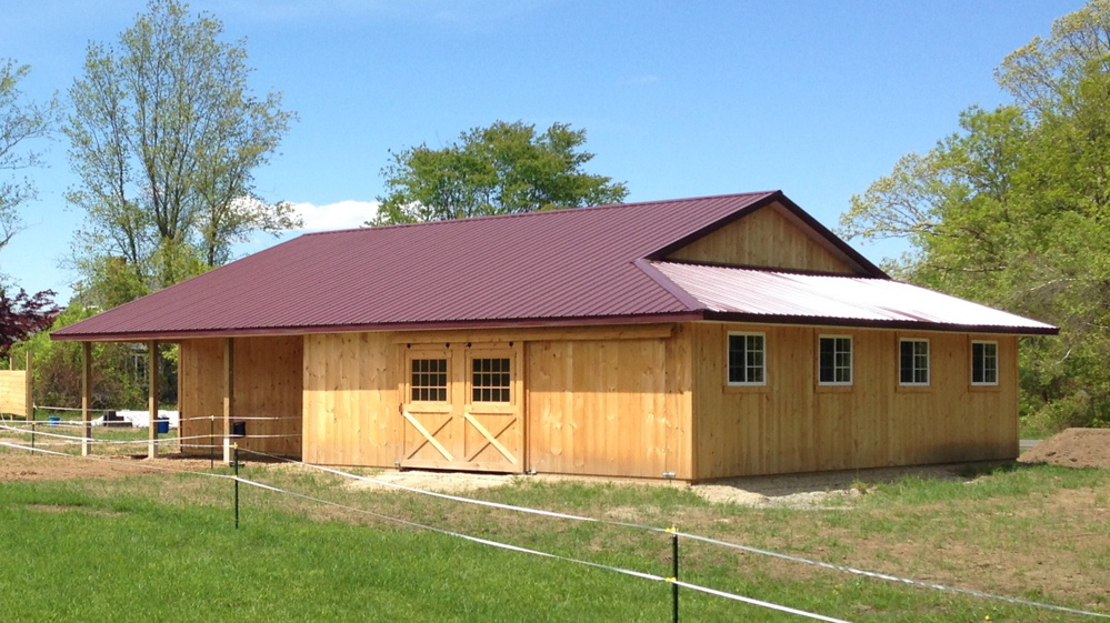 Horse barn with wrap around lean-to and open porch