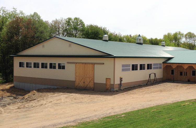 Front view of new arena with office area and porch