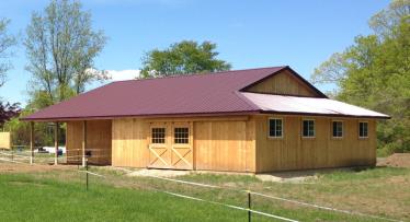 Horse barn measures 40X50 with an enclosed lean-to and open porch